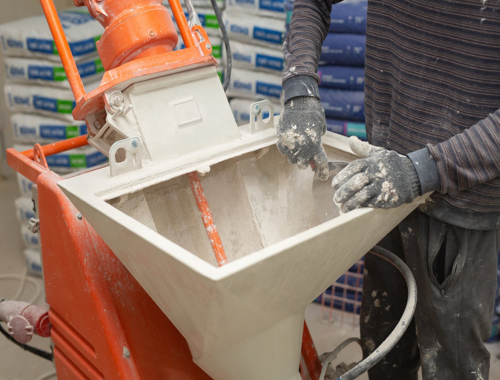 Plastering industrial pumping machine. Repair. Building